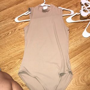 tan body suit